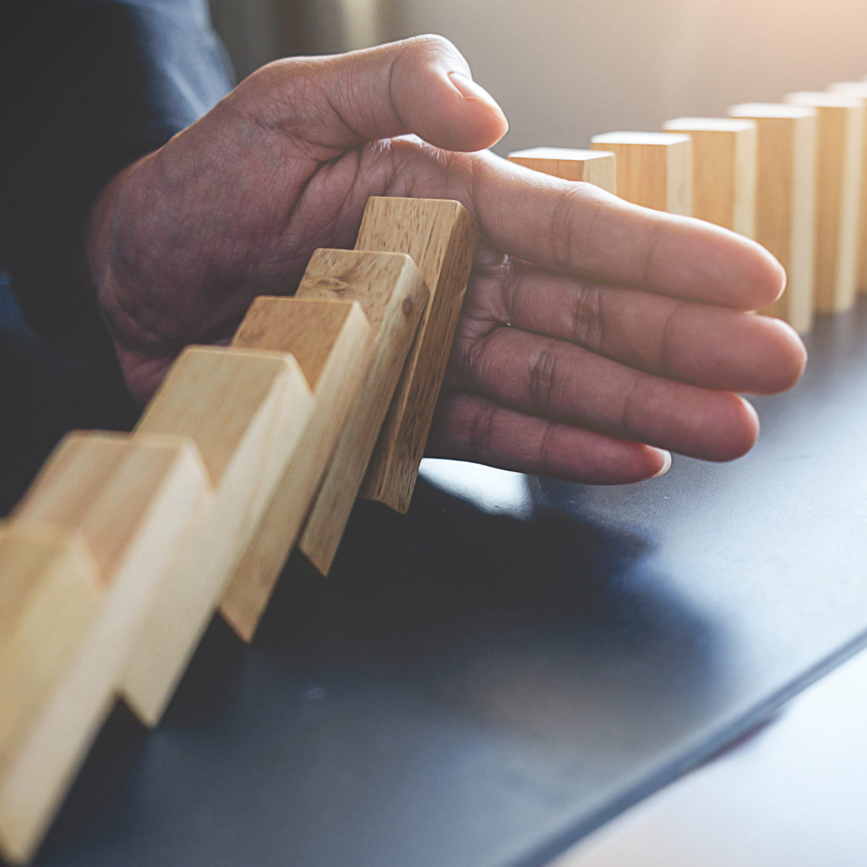 concept of solution and domino effect.slightly de focused and cl